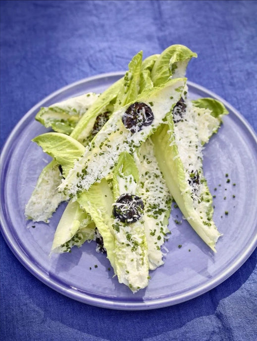Romaine lettuce with feta dressing and walnuts